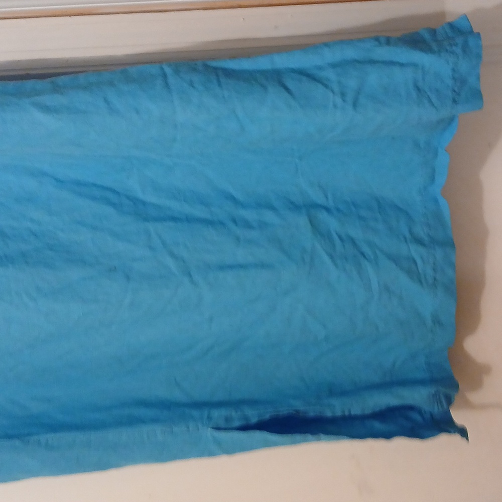 Aqua light blue skirt with pockets in the front and a split on the side - Picture 5 of 5
